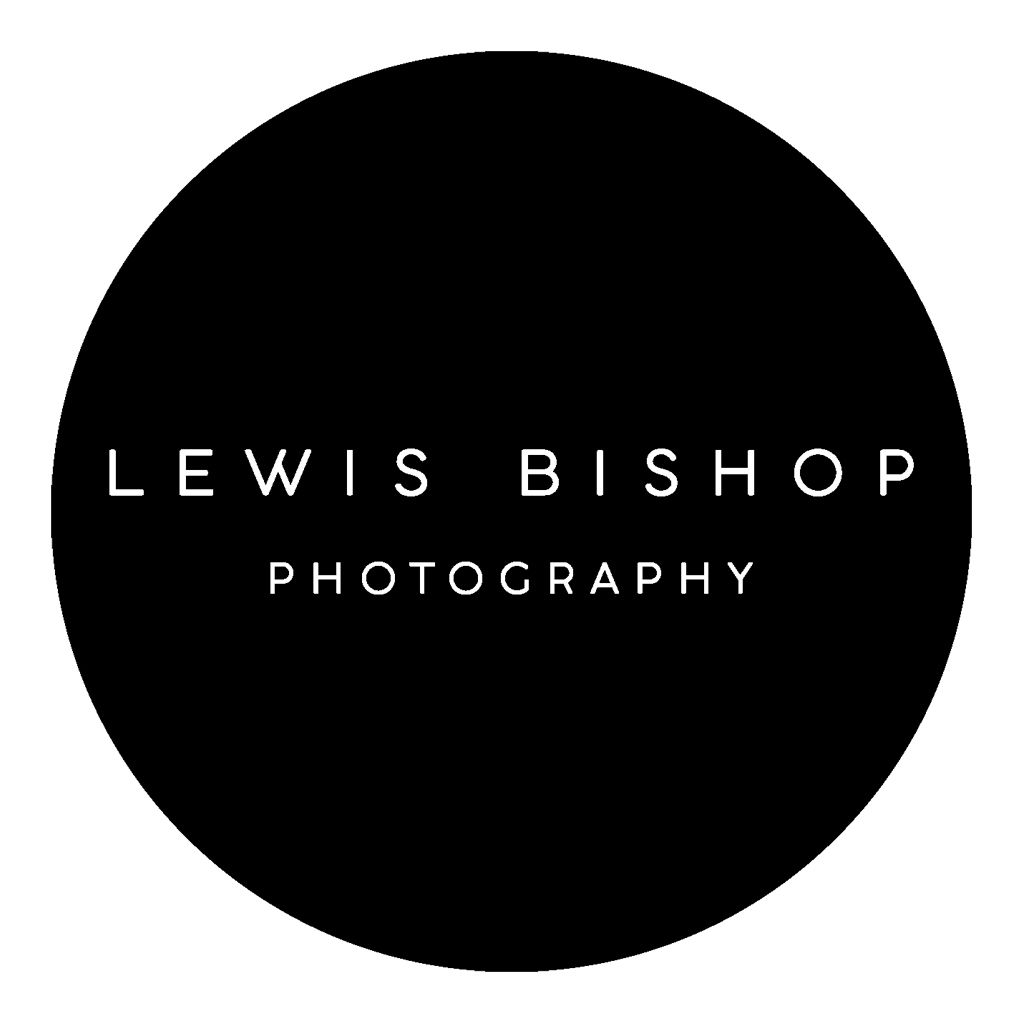 A black circle with the text "LEWIS BISHOP PHOTOGRAPHY" in white, capital letters. The word "LEWIS BISHOP" is larger and centered, with "PHOTOGRAPHY" in smaller letters directly underneath. Image by Documentary Wedding Photographer Lewis Bishop Photography.