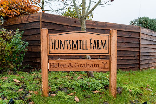 Huntsmill Farm signboard with names Helen & Graham.