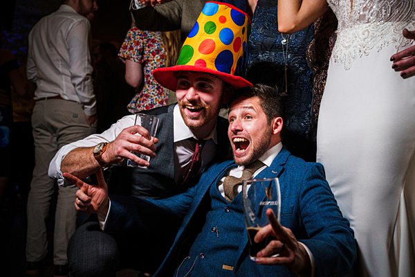 Men enjoying a lively party celebration.