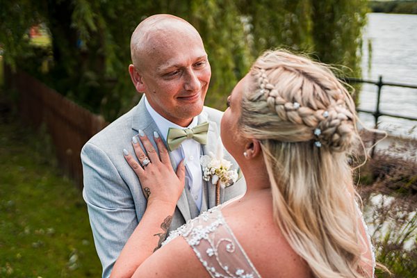 Bride and groom sharing a moment outdoors.