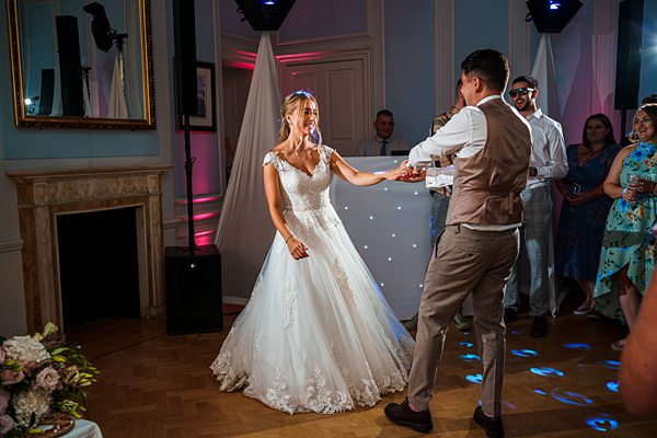 Bride and groom's first dance at wedding reception.