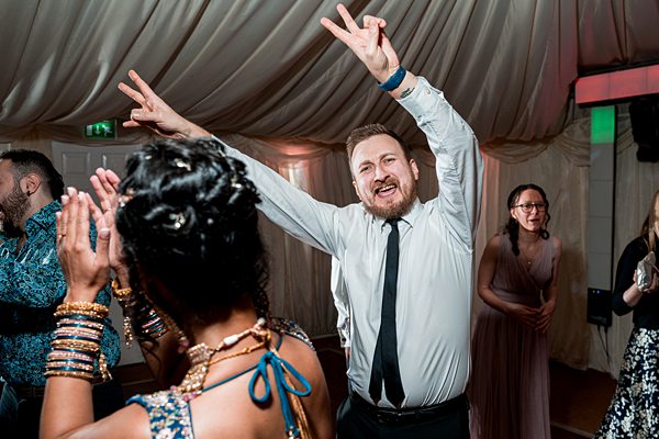 Joyful dancing at a festive party celebration.