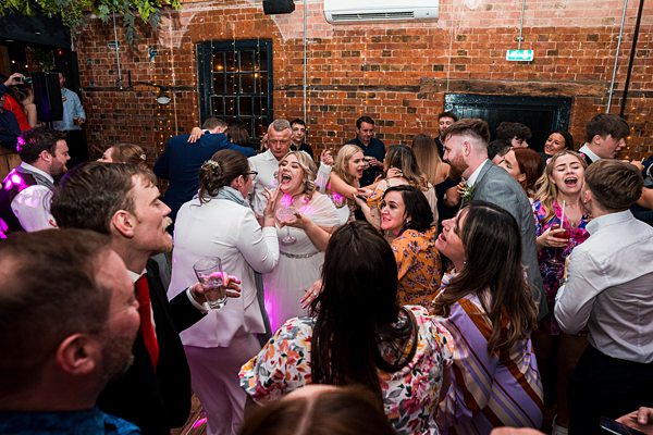 People celebrating at an indoor party.