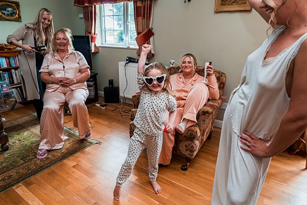 Family enjoying a living room dance party.