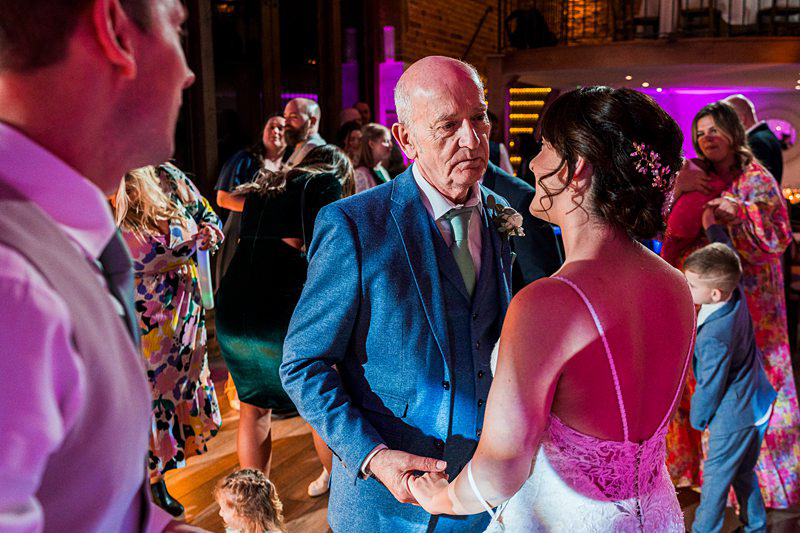 Father-daughter dance at wedding reception.