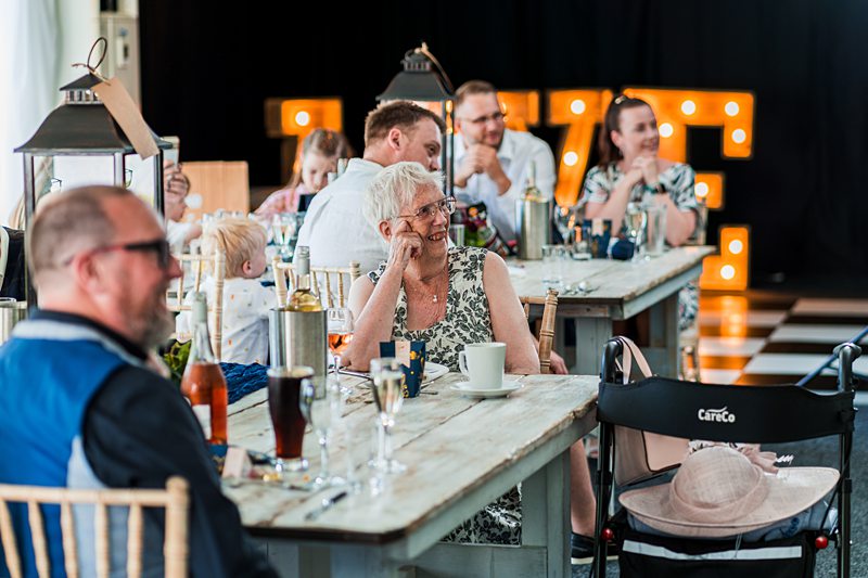 Guests enjoying a lively wedding reception.