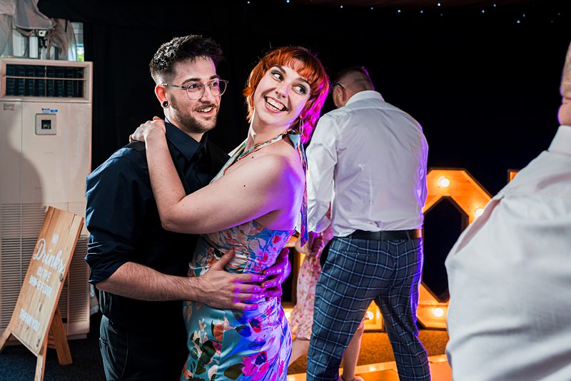Couple dancing at a wedding reception.