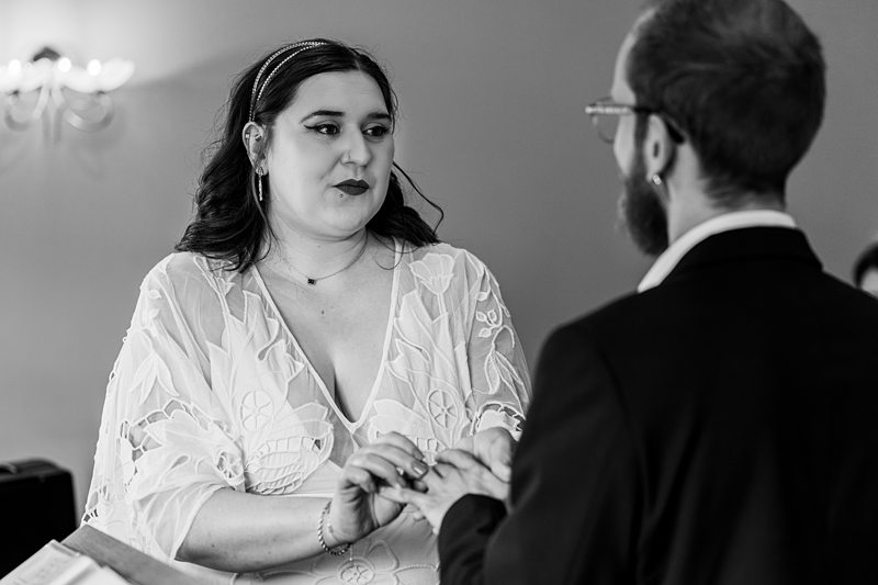 Couple exchanges rings at wedding ceremony