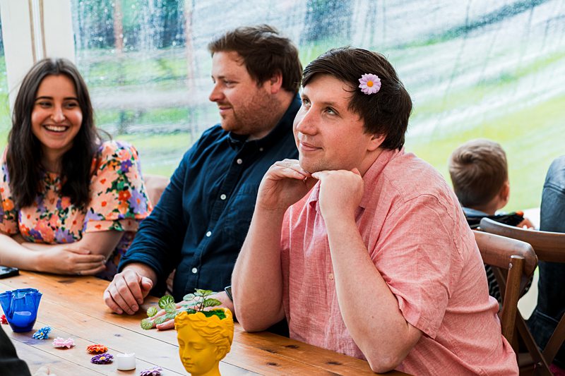 People enjoying conversation at a table