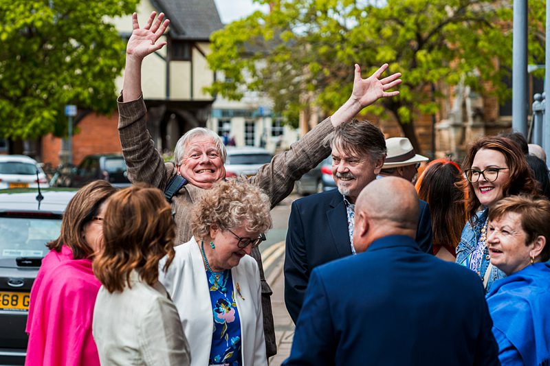 Joyful group of people outdoors.