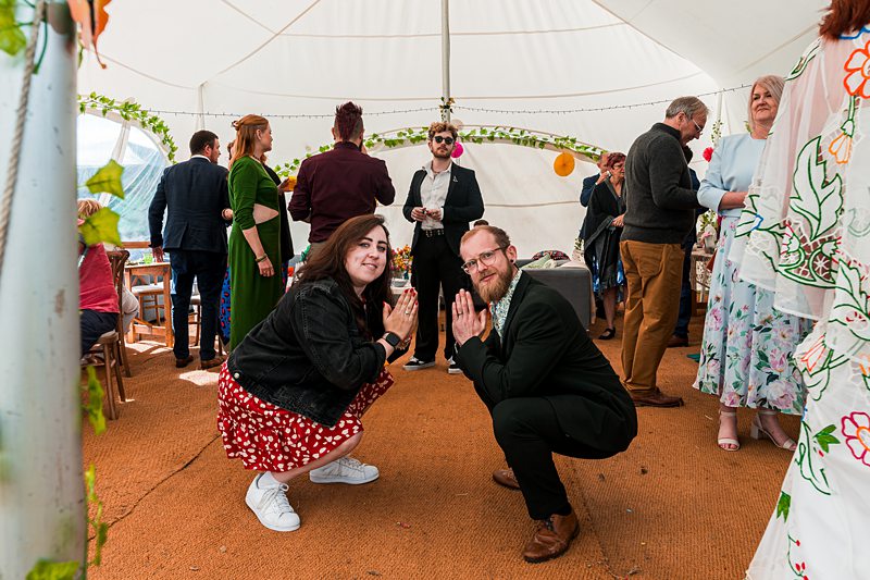 People gathered in decorated tent