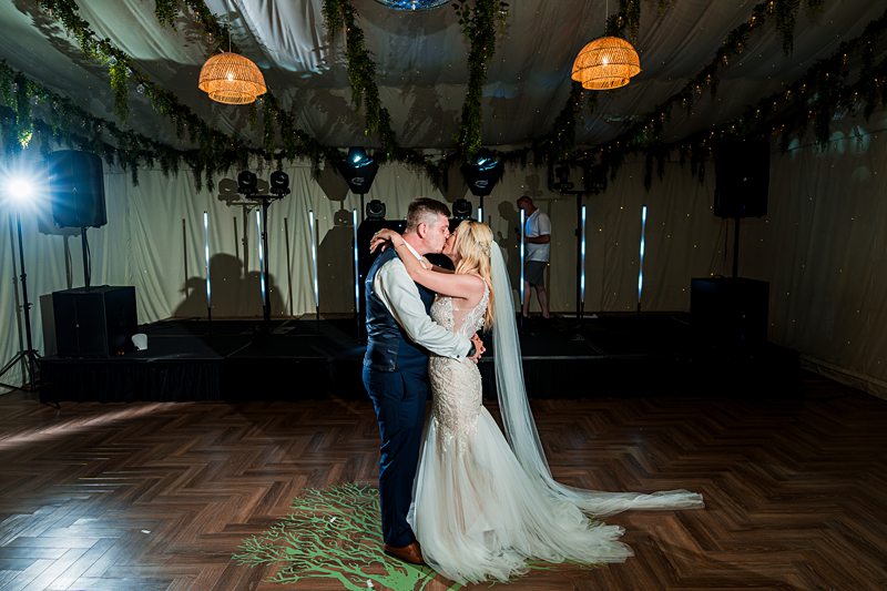 Bride and groom's first dance at wedding reception.