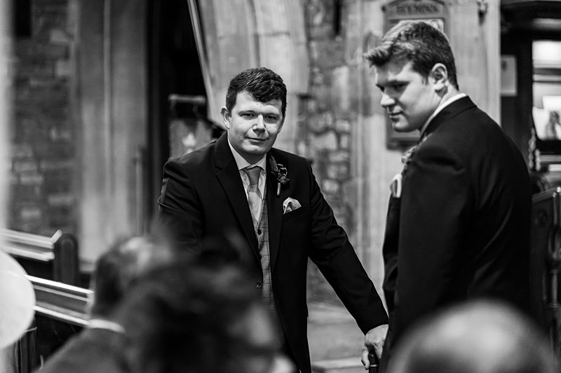 Two men in suits at a formal event.