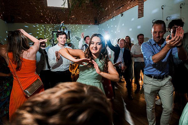 People dancing at a lively indoor party
