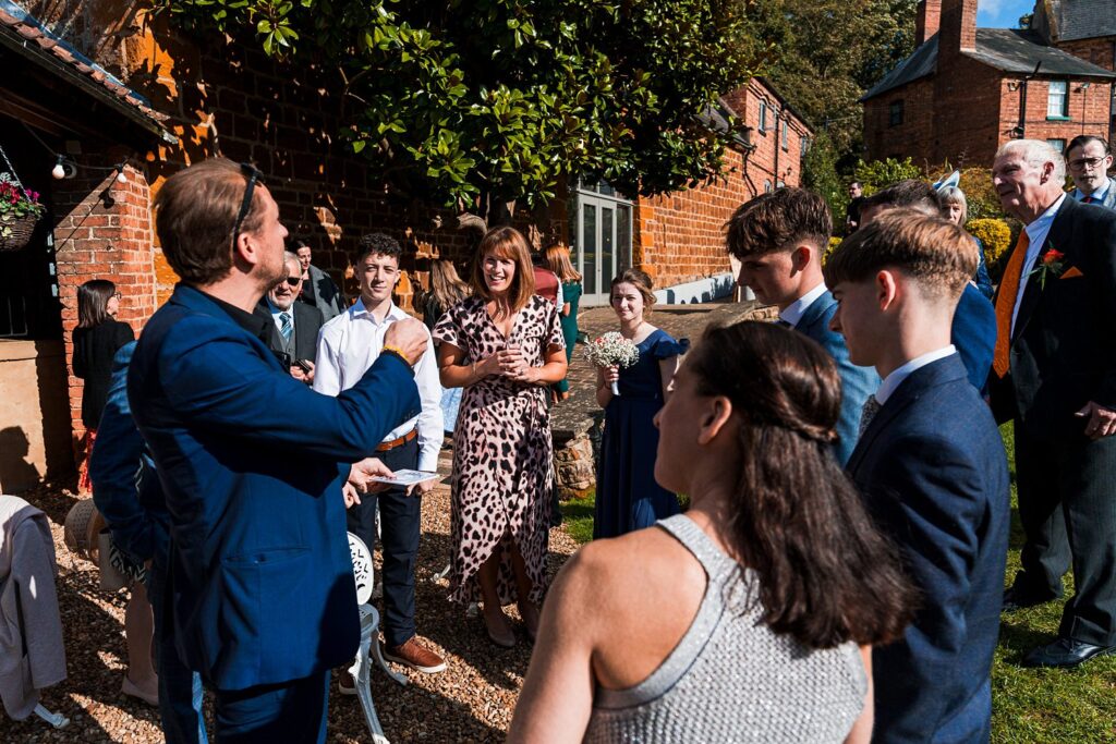 Guests socialising at an outdoor event.