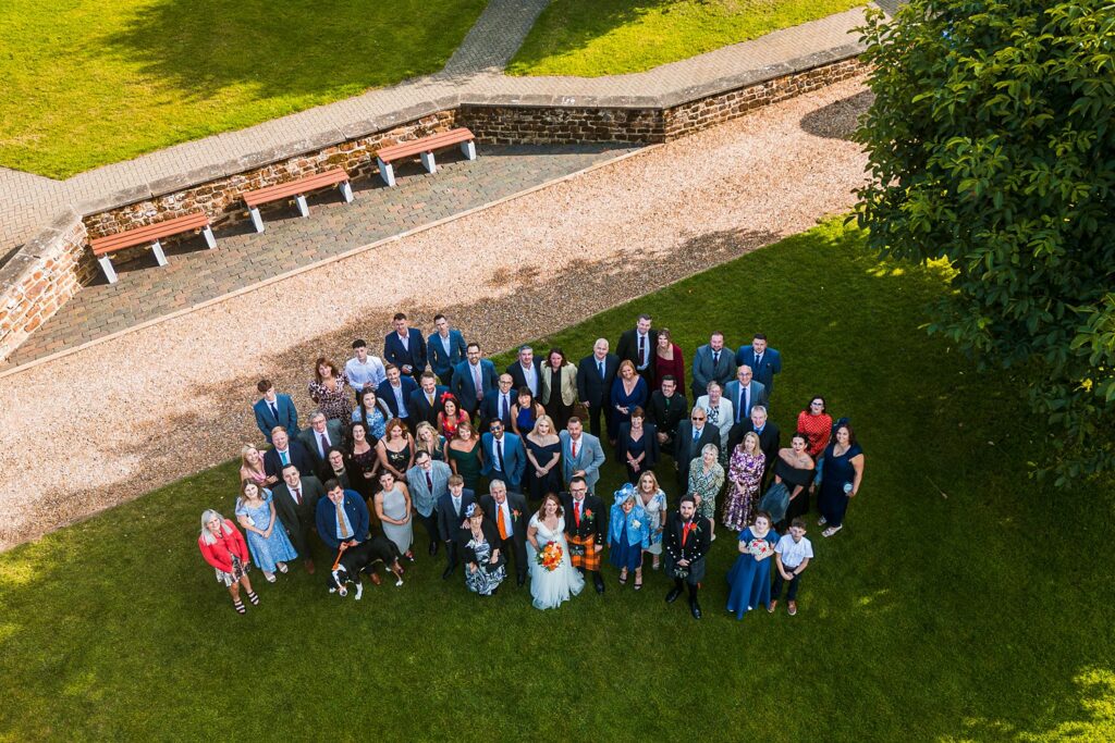 Large group photo at outdoor event.