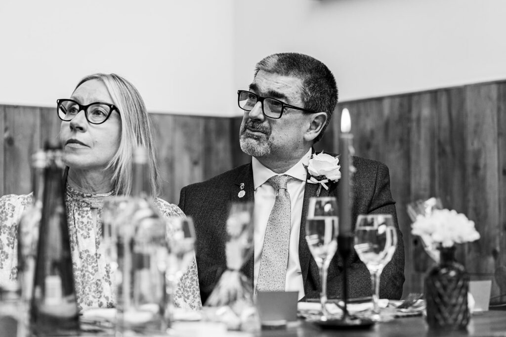 Formal dinner setting with two guests seated