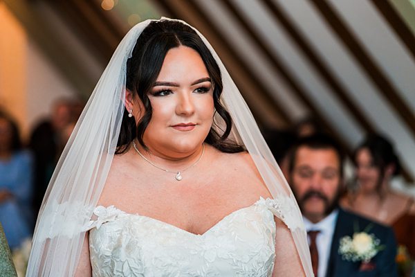 Bride in white dress on wedding day.