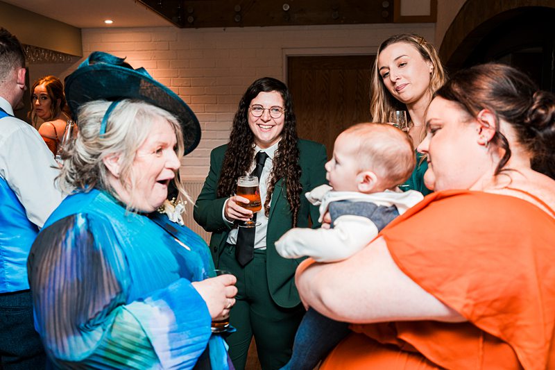 Group enjoying drinks at a celebration