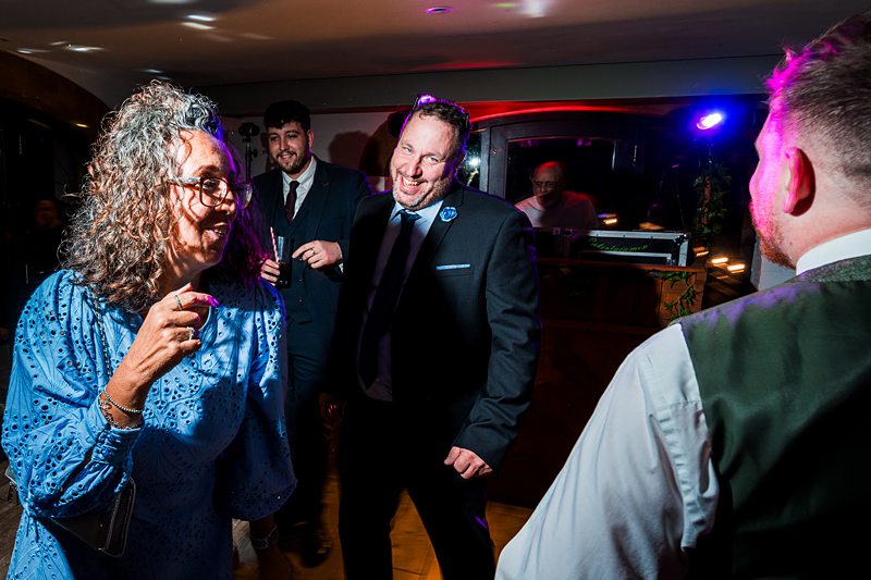 People enjoying a lively party atmosphere.