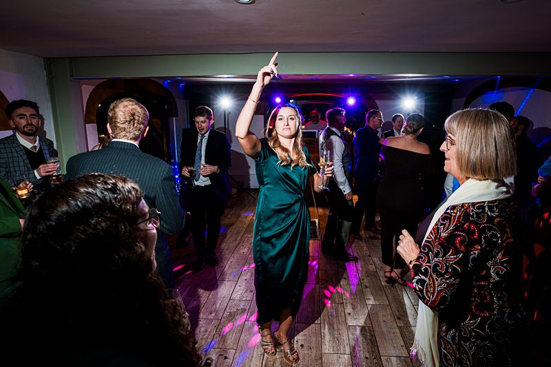 People dancing at a lively evening party.