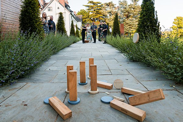 Garden game on path with guests watching.