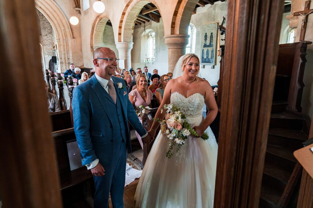 Happy couple marrying in a historic church.