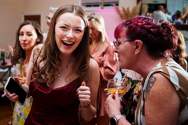 Women enjoying a lively party scene.