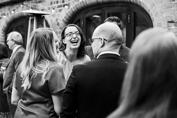 Group laughing at outdoor social event