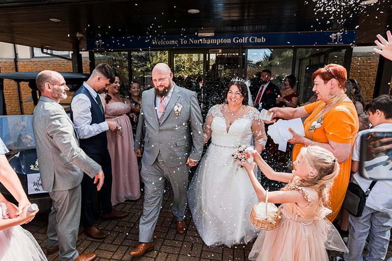 Wedding celebration at Northampton Golf Club entrance.