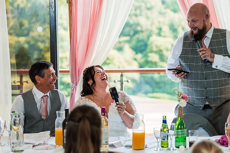 Wedding speech brings laughter to bride and groom.