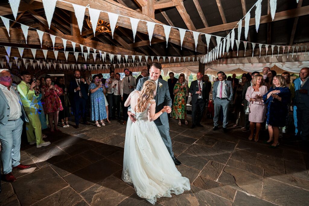 Bride and groom's first dance at wedding reception.
