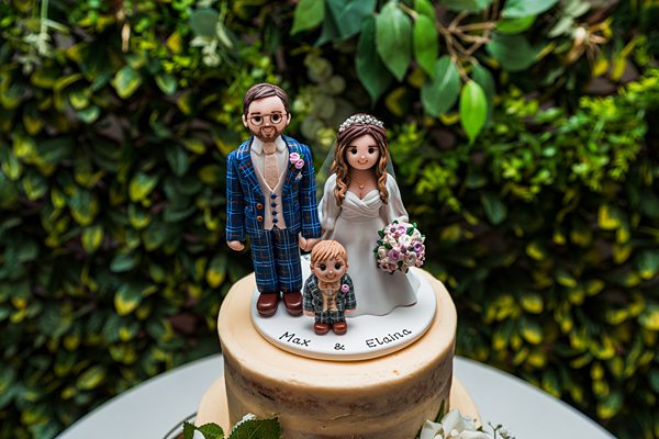 Wedding cake with personalised figurine toppers