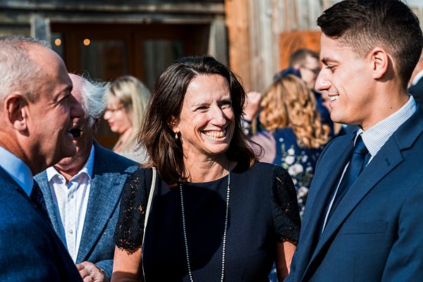 Group of people smiling at an event.