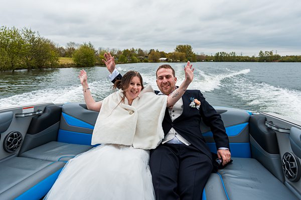 Bride and groom on a boat ride.
