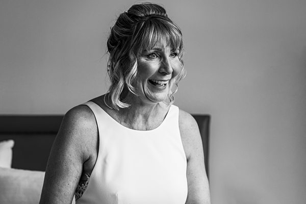 Smiling woman in white dress portrait